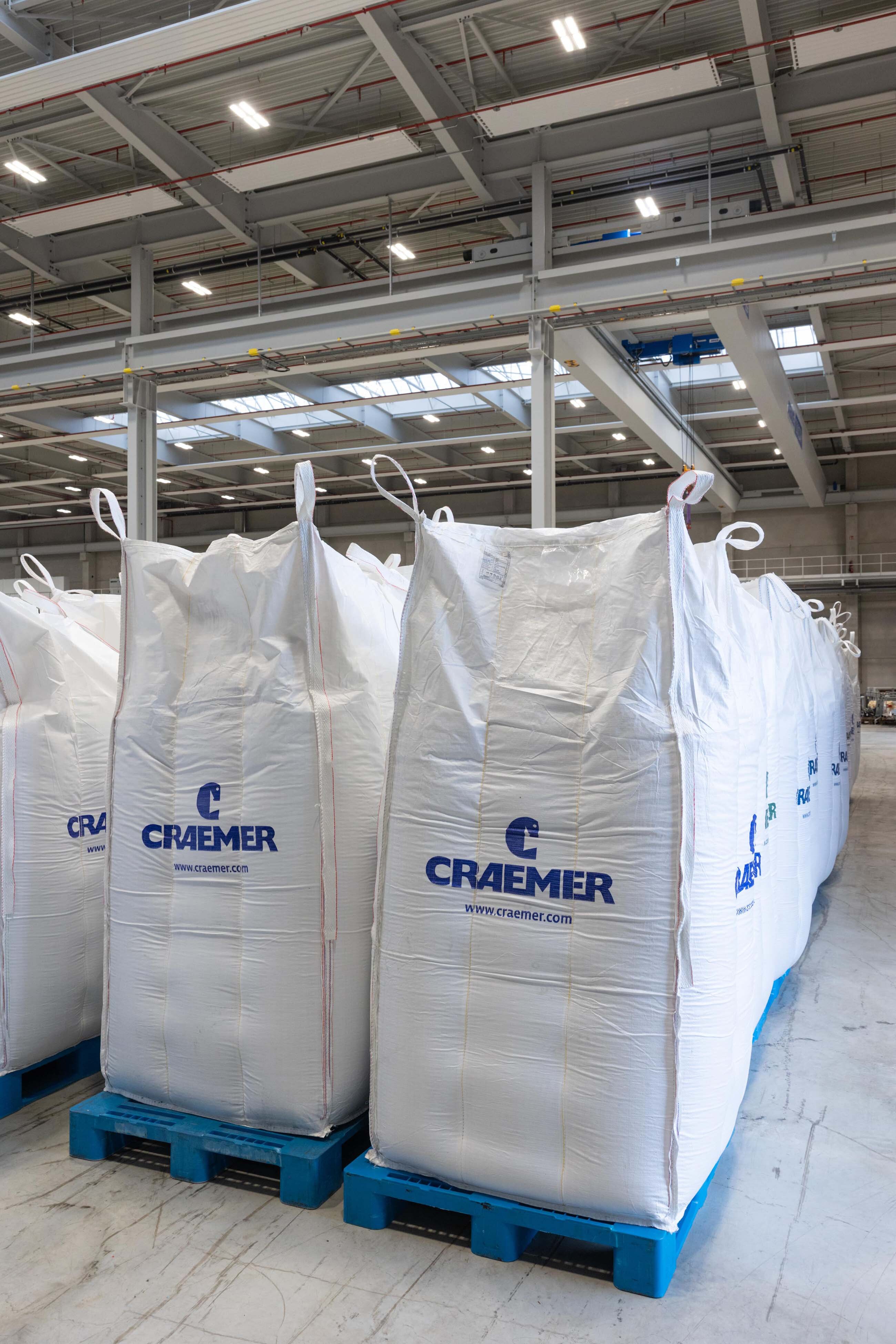 Craemer regranulate in white bags with Craemer logo